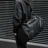 plain black large duffel gym bag with wet and dry compartments