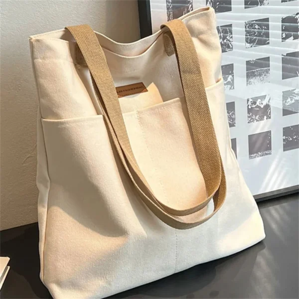 women’s advanced sense canvas tote bag with sewing thread details
