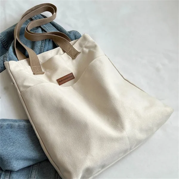 women’s advanced sense canvas tote bag with sewing thread details